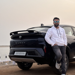 Ayaz with dark car